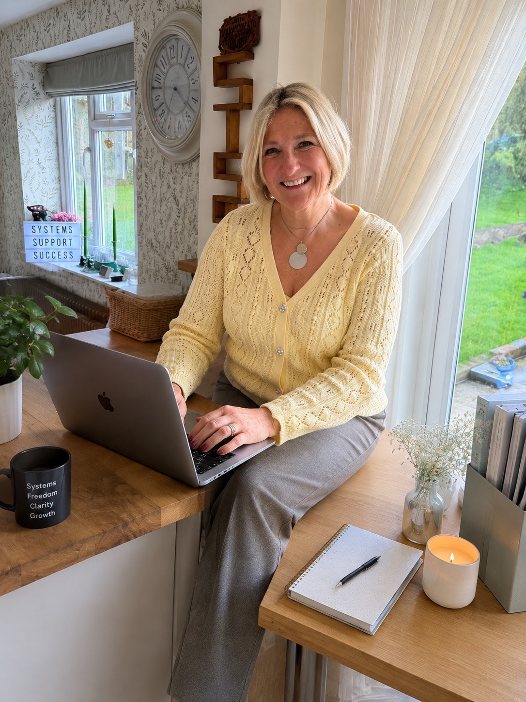 Founder of Gemini Small Business Support working at her desk
